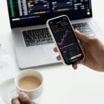 Wall Street Holds Near Record Highs as Oil Plunges, Tech Surges, and Bitcoin Breaks New Ground